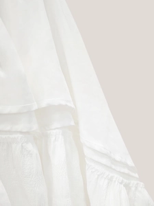 Elegant white V-neck short sleeve dress with tiered ruffles and textured chiffon fabric
