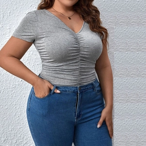 Detail view of the v-neck ruched light gray short sleeve t-shirt with knit fabric texture