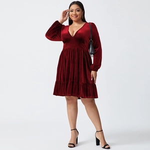Detail of plus size wine red velvet dress with elegant V-neck and long sleeves