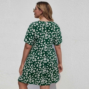 Vue arrière de robe trapèze grande taille vert foncé avec imprimé fleuri marguerites