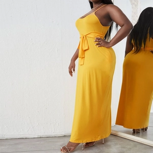 Bright yellow knit maxi dress with spaghetti straps and a waist tie, front and back view
