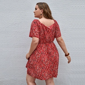 Red plus size floral dress with daisy print and elegant V-neck back for summer beach vacations