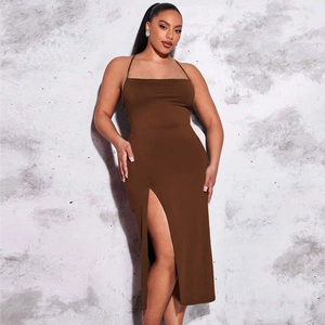 Detail view of the high side slit on this sexy backless bodycon dress in dark brown