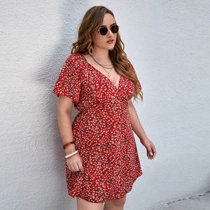 Red V-neck floral mini dress with butterfly sleeves for summer beach vacation style