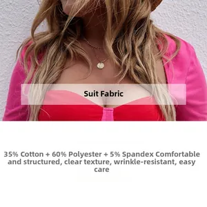 Detail of pink and red contrast fabric showing wrinkle-resistant cotton blend texture