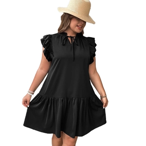 Women's plus size black sleeveless ruffle dress with V-neck tie and layered hem
