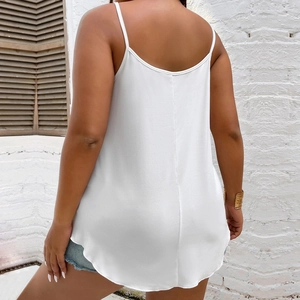 Back view of a white spaghetti strap tank top with a curved hem and minimalist summer style