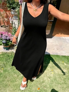 Elegant black V-neck sleeveless maxi dress with side slit for summer casual style