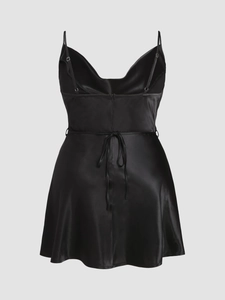 Elegant black satin A-line slip dress with thin straps and draped neckline for women