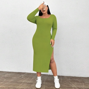 Detail view of avocado green ribbed knit dress featuring a side slit and U-neckline