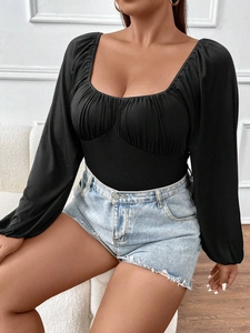 Slim fit black long sleeve bodysuit with square neckline and gathered puff sleeves