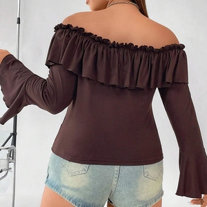 Close-up of ruffles and bell sleeves on an off-the-shoulder slim fit top for women