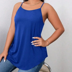 Detailed view of royal blue camisole with thin straps and a curved hemline