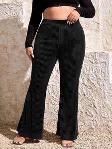 Pantalon patte d'eph noir à taille haute nervurée pour femme style tendance automne