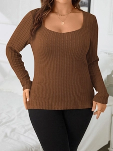 Detail of dark brown slim fit knit top with waffle texture and elegant square neckline