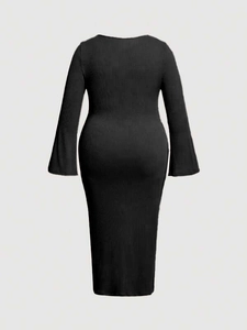 Slim fit black ribbed knit dress featuring elegant flare sleeves and a round neckline
