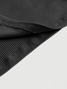 Elegant slim fit black ribbed knit dress with detailed double-stitched hem and neckline