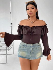 Off-shoulder brown top with ruffle sleeves and denim skirt outfit on model