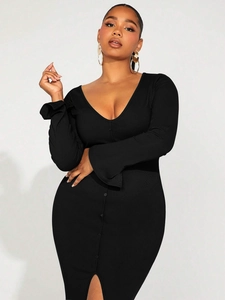 Elegant black rib-knit V-neck dress with front buttons, long sleeves and leg slit