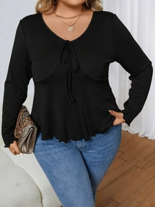 Plus size black V-neck knitted long sleeve top with lace-up detail and ribbed texture