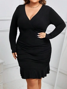 Elegant plus size black V-neck long sleeve ruched dress with ruffle fishtail hemline