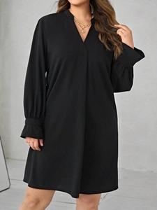 Women's V-neck black long sleeve dress with ruffle cuff details in a loose casual style