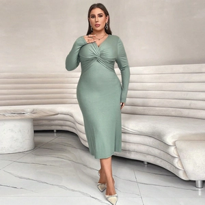 Elegant sage green long sleeve V-neck knit midi dress with twist detail and fishtail hem