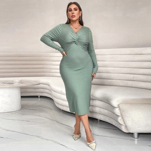 Detail of elegant V-neck twist knot design on a slim-fit green knitted midi dress