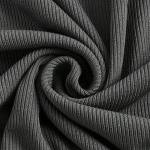Slim fit dark grey ribbed knit long sleeve dress showing soft spiral fabric texture