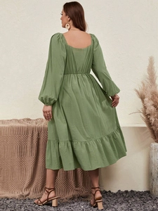 Elegant dark green puff sleeve midi dress with cinched waist and tiered ruffle hemline