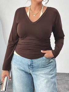 Slim fit coffee brown V-neck knit top with halter design and long sleeves for women