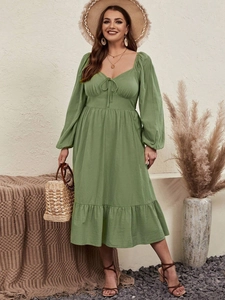 Sage green puff sleeve midi dress with sweetheart neckline and ruffled hem in pastoral style