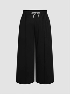 Pantalon large noir pour femme avec taille haute élastique et cordon de serrage blanc