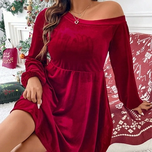 Detail of red velvet off-shoulder dress with elegant pleated waist and long sleeves