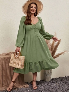 Bohemian grass green midi dress with heart neckline, puff sleeves and ruffled hemline