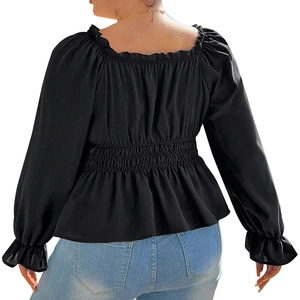 Women's black square neck top with puff sleeves and smocked waist shown from the back