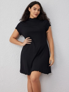 Elegant black ribbed knit short sleeve dress with ruffle trim and high neckline