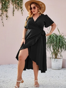 Elegant black wrap midi dress with V-neck and ruffled sleeves in a slim fit silhouette
