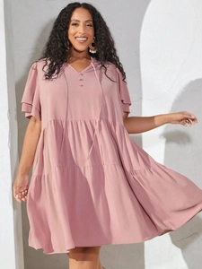Dusty rose V-neck tiered babydoll dress with ruffle sleeves and drawstring neckline