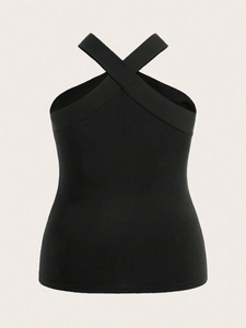 Women's black halter neck top featuring a stylish crisscross back and slim fit design