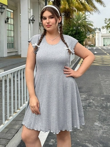 Grey rib-knit mini dress with ruffled sleeves and white bow details in an A-line silhouette