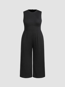 Chic black sleeveless wide-leg jumpsuit with ribbed fabric and waist-slimming panel