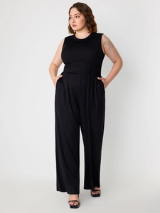 Sleeveless black wide-leg jumpsuit with ribbed texture and cinched waist design