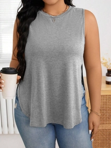 Detail view of grey sleeveless sports tank top with side slits and knitted texture