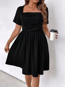 Women's black square neck short sleeve dress with ruched waist and A-line silhouette