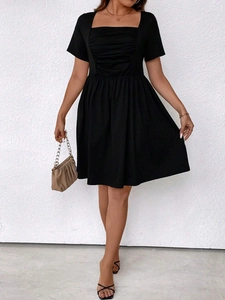 Elegant black square neck mini dress with pleated bust and flared A-line silhouette for women
