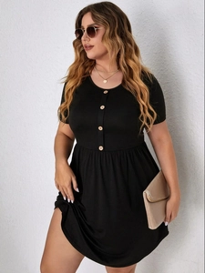 Elegant black plus size short sleeve dress with wooden buttons and flowing silhouette