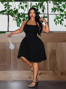 Elegant black halter neck dress with square collar and slim A-line silhouette for women