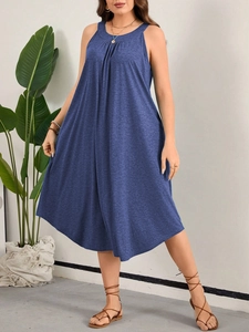 Blue sleeveless halter neck beach dress with pleats and A-line cut for casual summer vacation