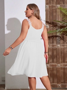Elegant white plus size A-line dress with lace shoulder straps and high waist design